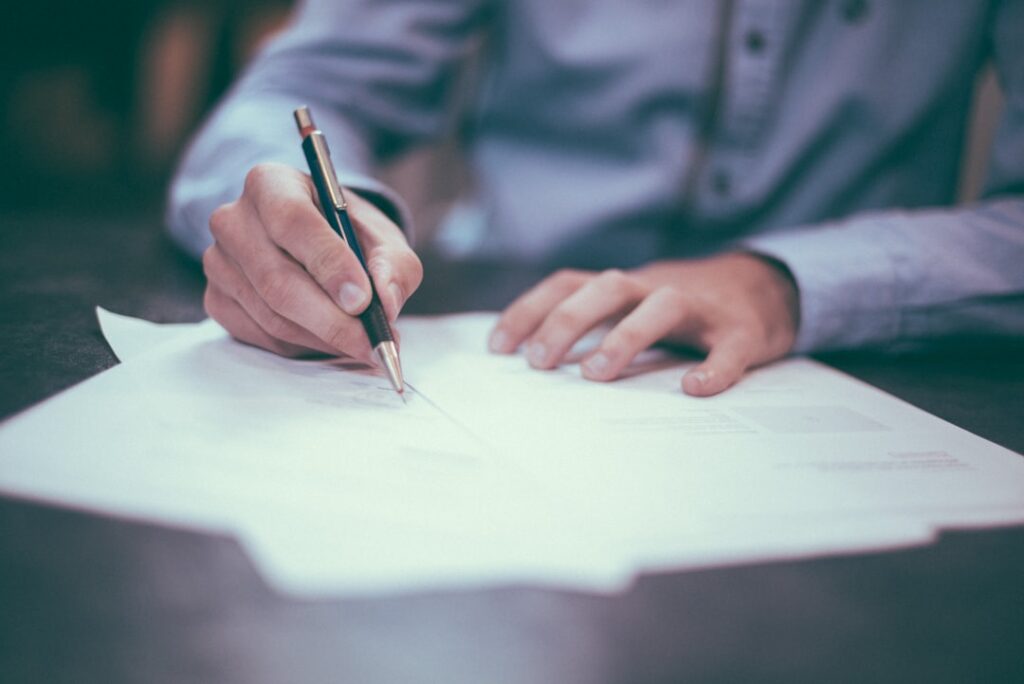 person doing paperwork